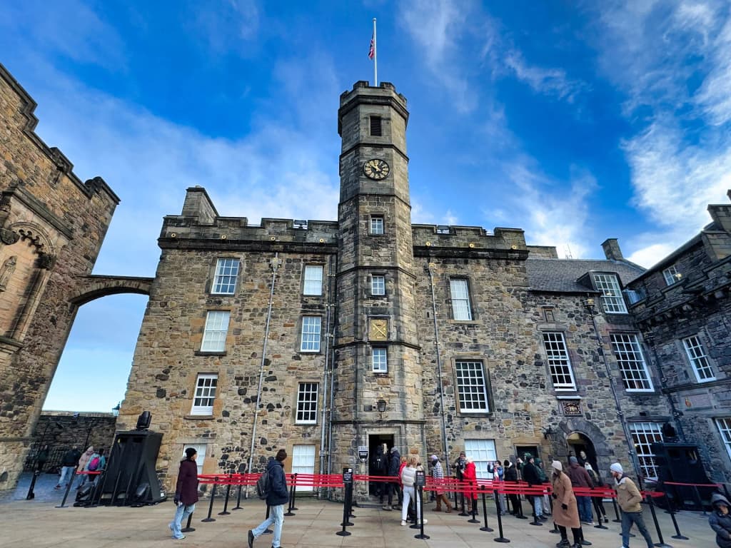 Edinburgh Castle at sunset, glowing above the city