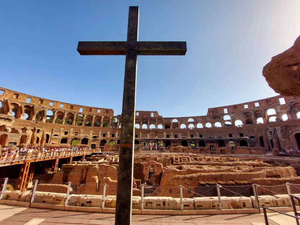 Vespa tour with Colosseum in background, Rome