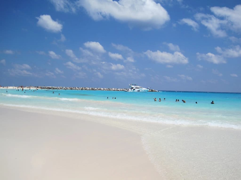 Playa Delfines’ wild surf and iconic sign