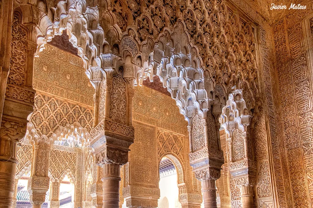 Courtyard with fountains and lush gardens inside the Alhambra