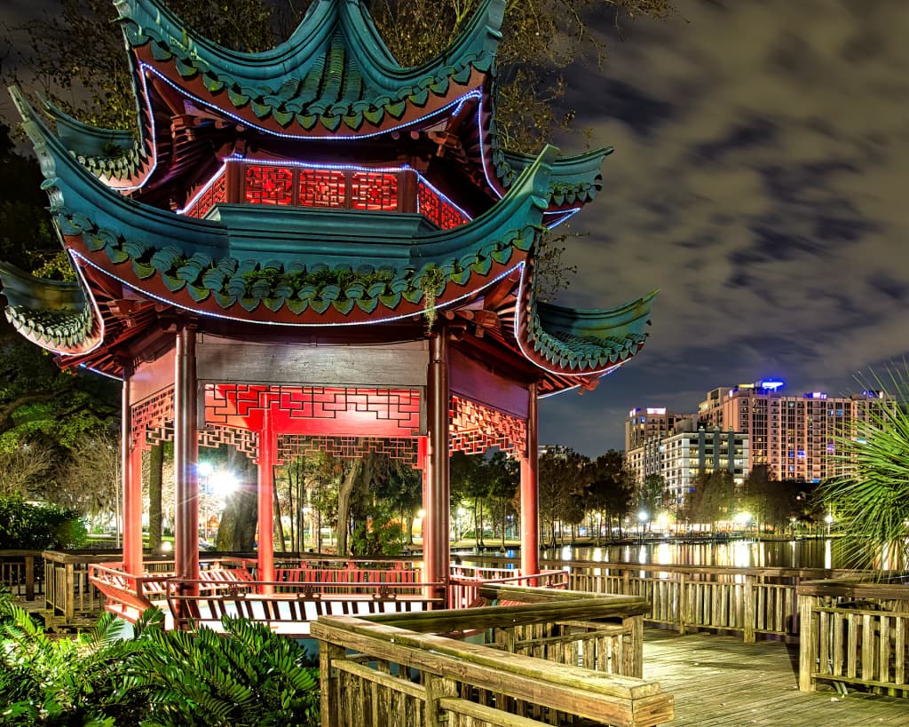Lake Eola Park's swan boats and cityscape