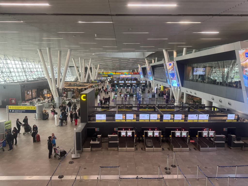 Arturo Merino Benitez International Airport exterior at dusk