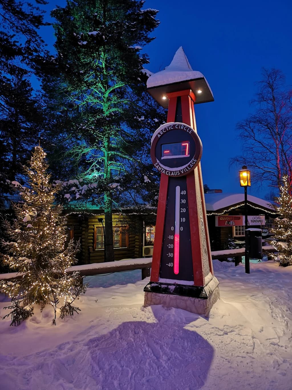 Reindeer sleigh gliding through snowy Lapland forest