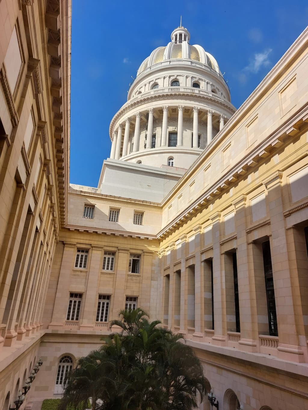 Malecón Havana at sunset with classic cars