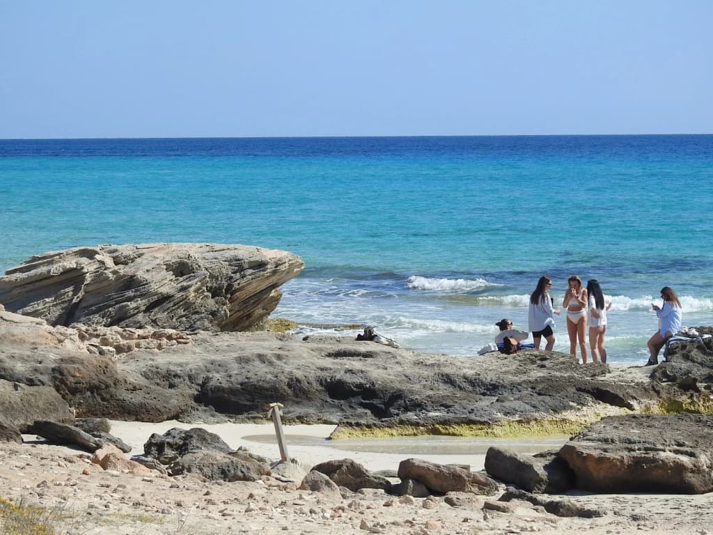 Seaside restaurant terrace with paella and sea view in Formentera