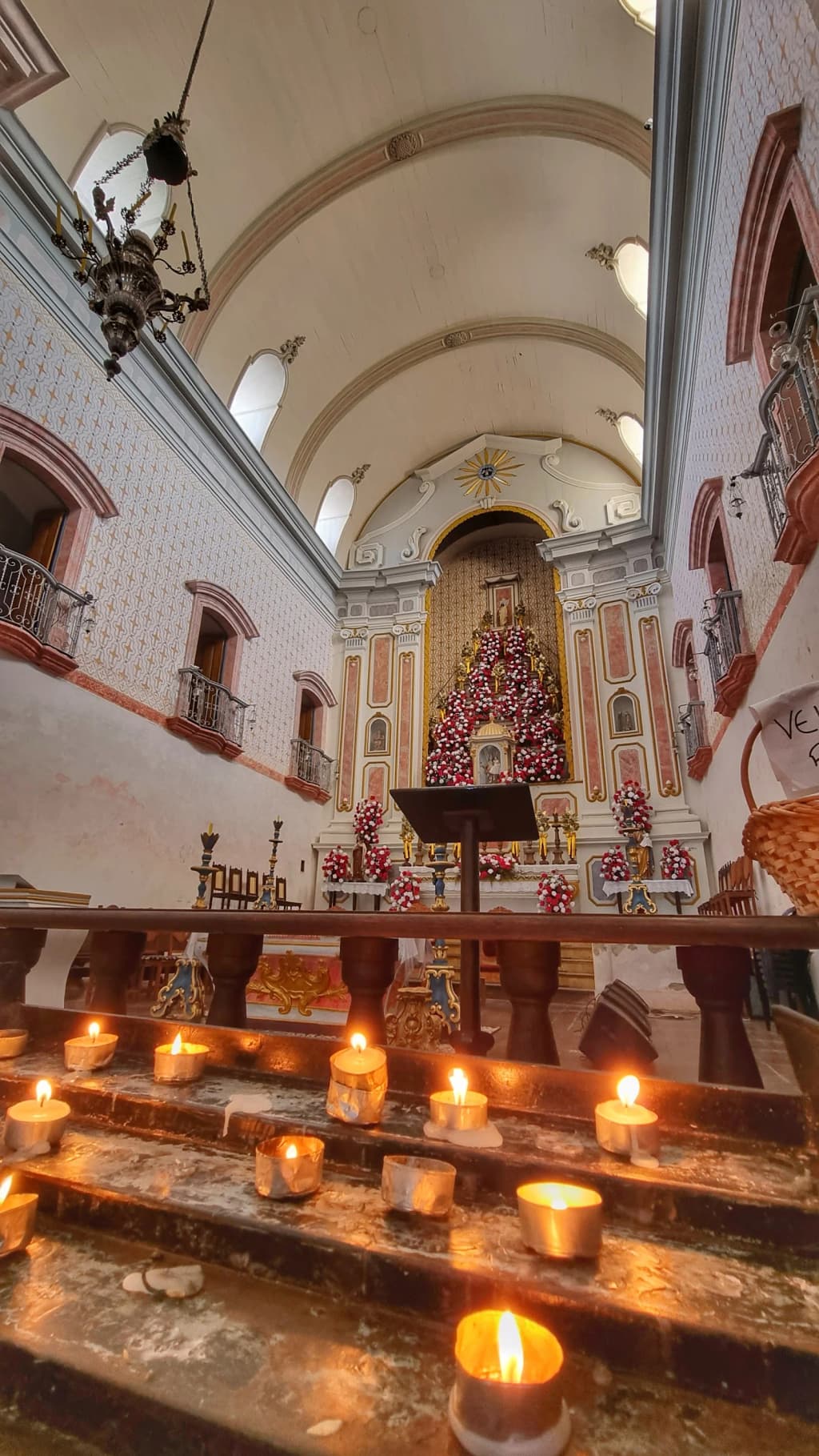 Sunset over Paraty's bay, boats and mountains silhouetted
