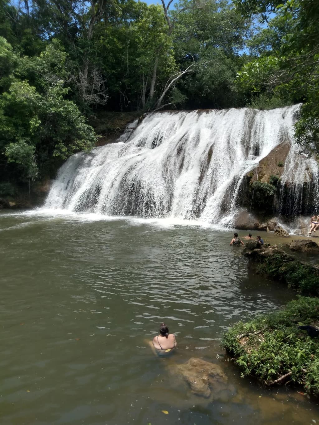 Kayaking through turquoise canyon waters in Bonito