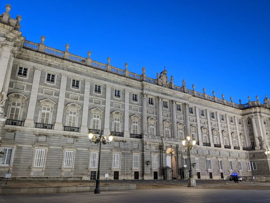 Royal Palace of Madrid glowing at sunset