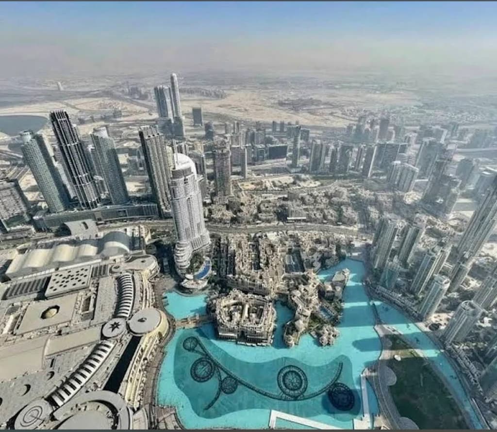 Sheikh Zayed Grand Mosque's white domes and golden details