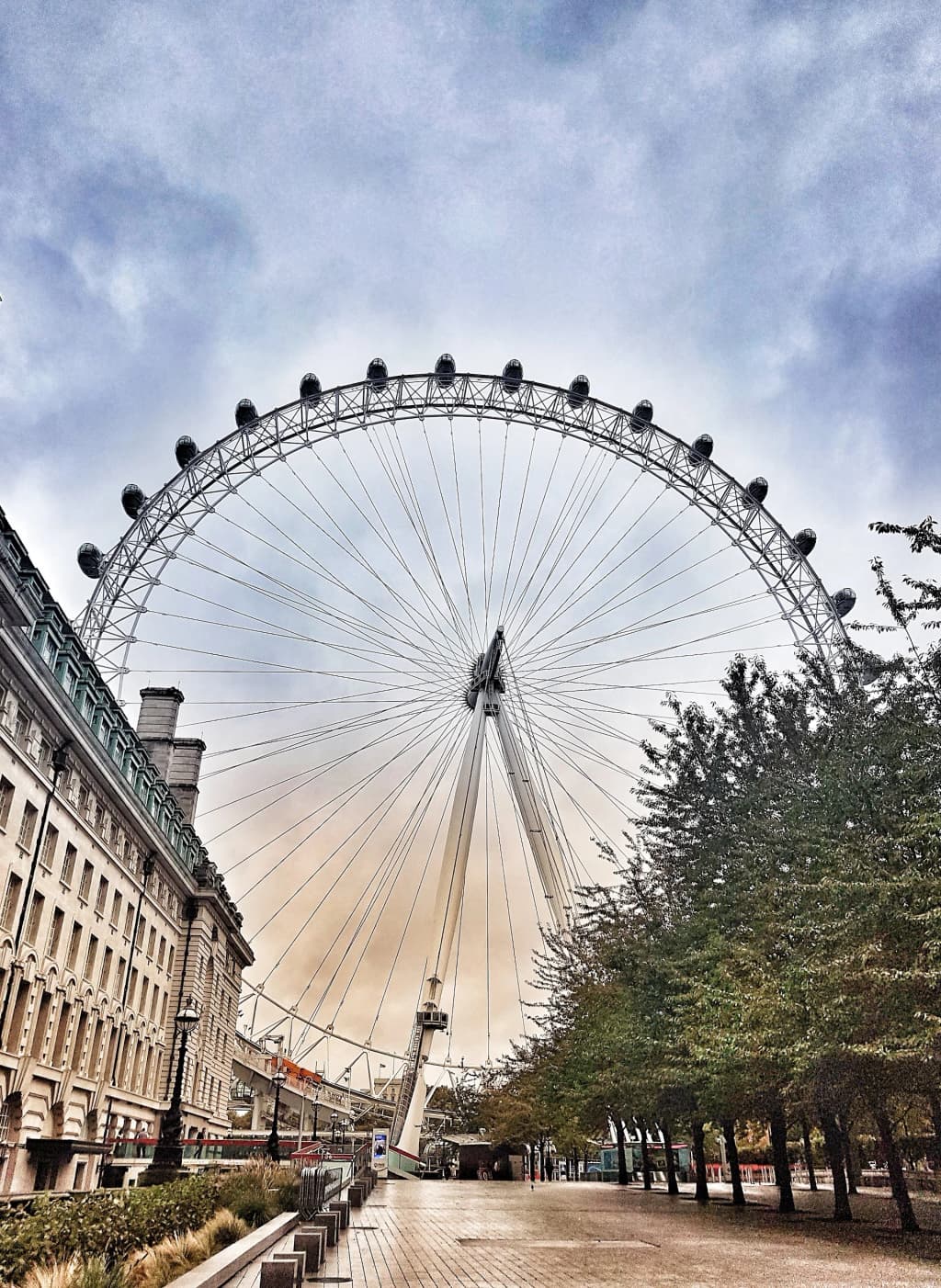 London Eye from the riverside, crowds and city lights