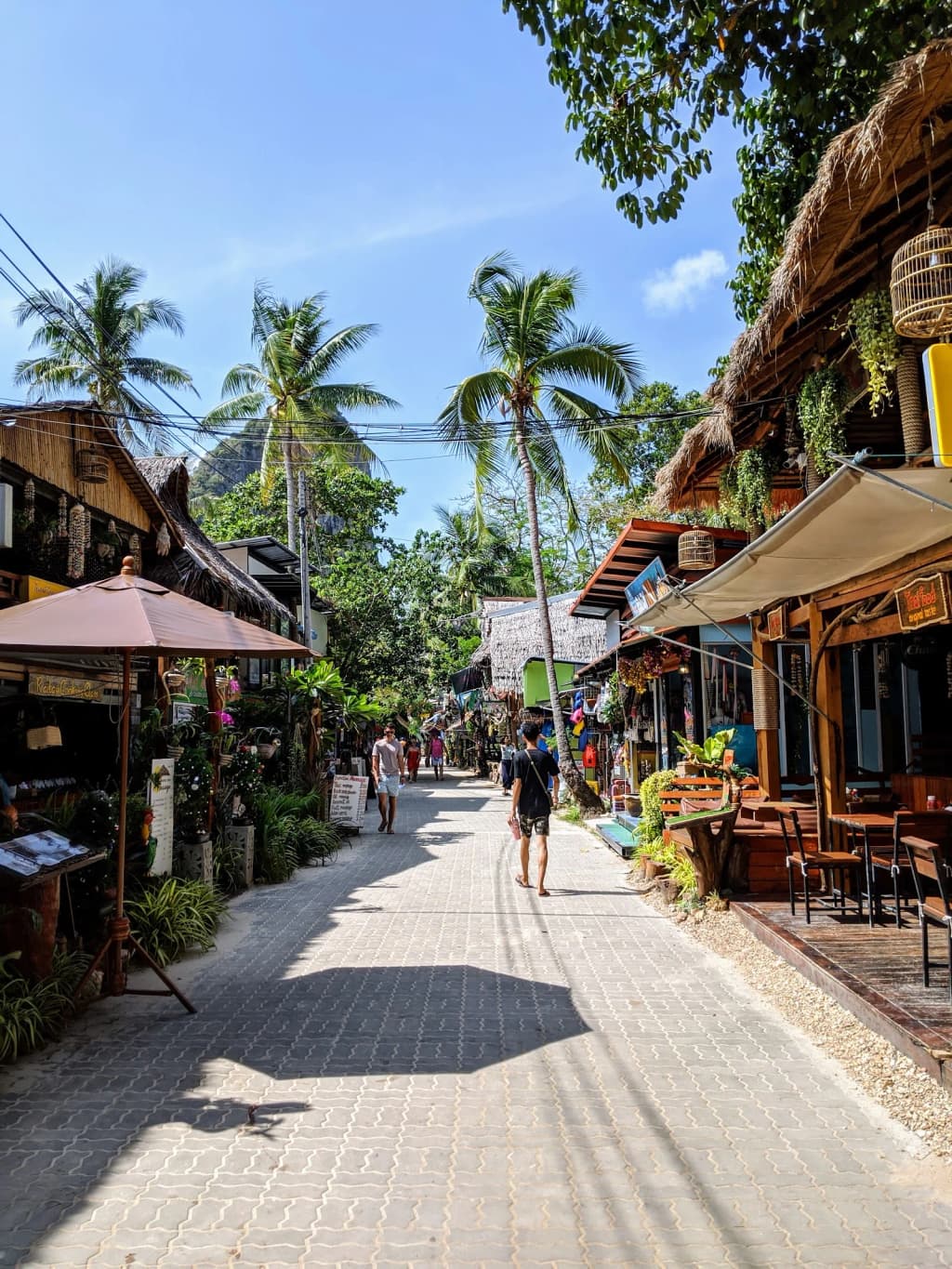 Inside Princess Cave, with colorful offerings and limestone walls