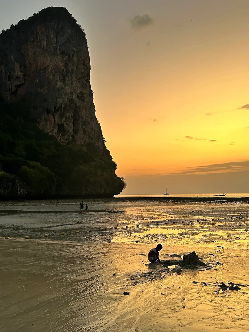 Nightlife at a beach club in Ao Nang, with neon lights and a pool