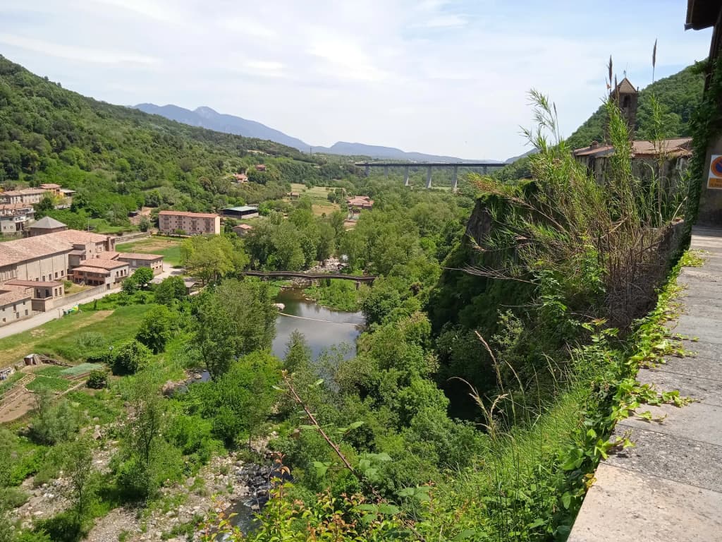 Medieval houses clinging to the basalt cliff in Castellfollit de la Roca