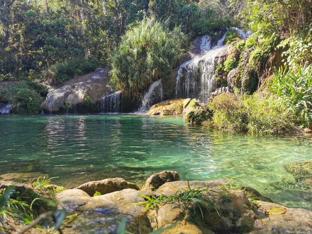 El Nicho Waterfalls, turquoise pools and lush jungle