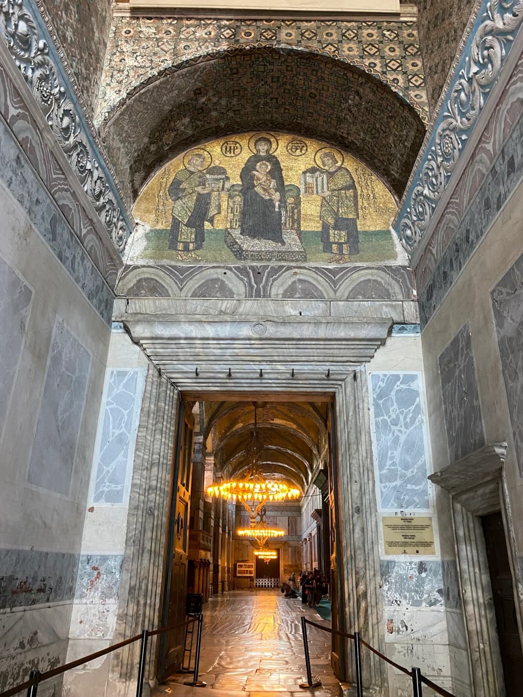 A private boat glides along the Bosphorus, with Istanbul’s skyline and bridges in the background.