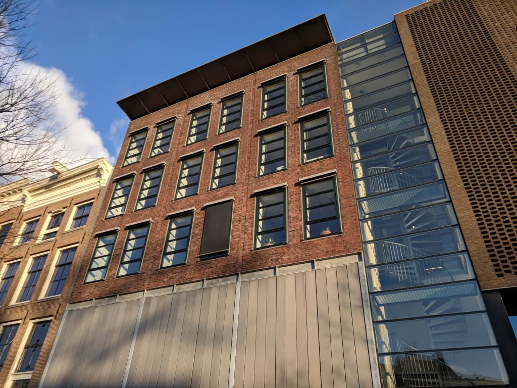 Tony's Chocolonely Superstore Amsterdam - shelves of colorful chocolate bars