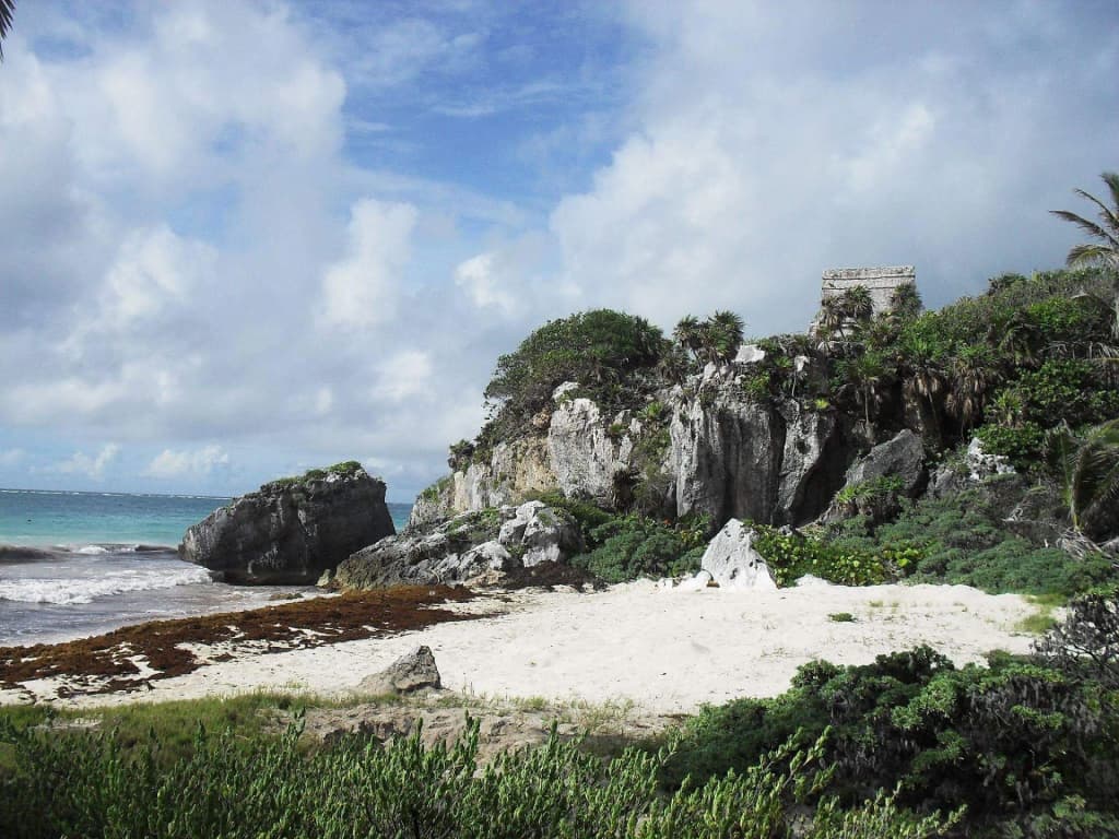 Gran Cenote near Tulum, sunlight streaming into blue water