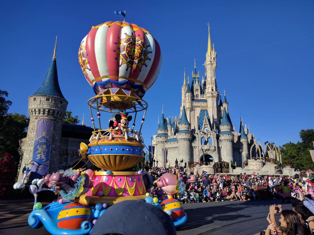 Magic Kingdom Park at sunrise, pastel sky and empty walkways