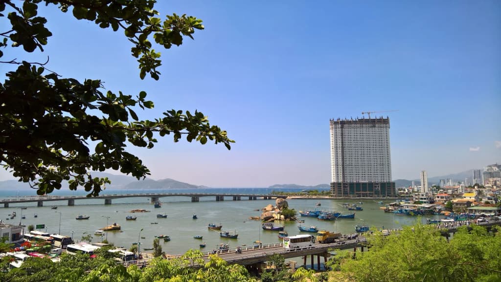 Scooters racing through neon-lit streets in Vietnam
