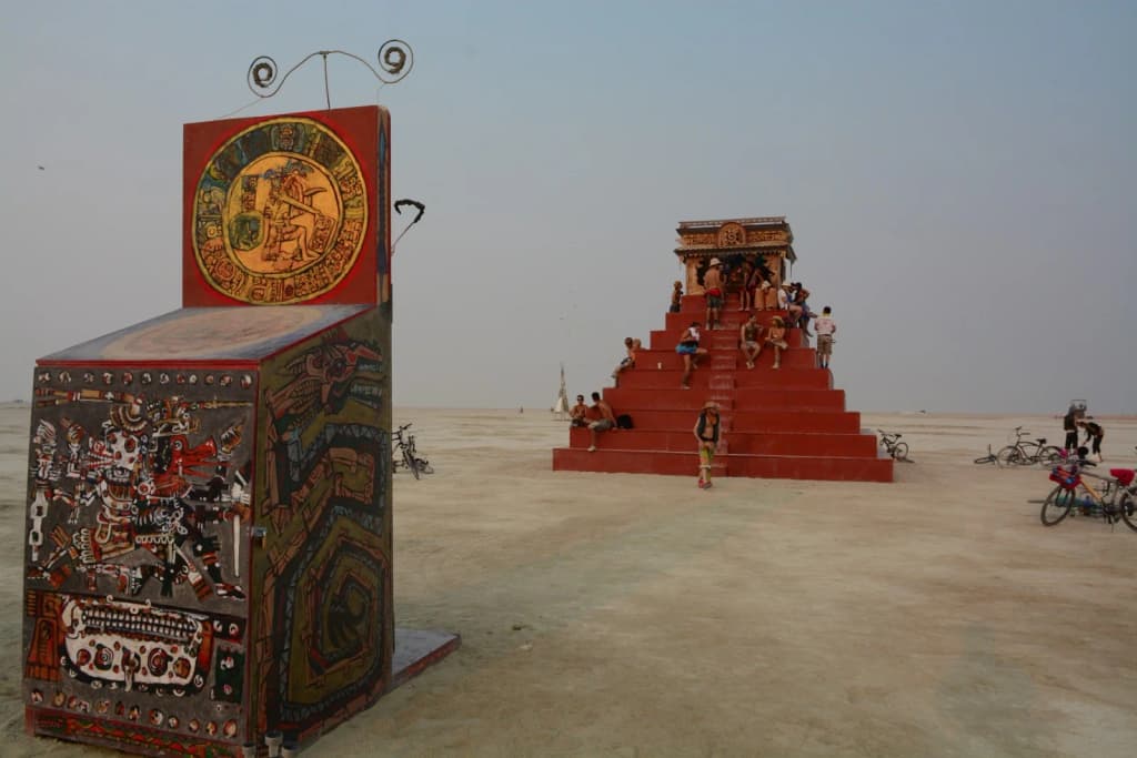Cyclists and art cars in Black Rock City