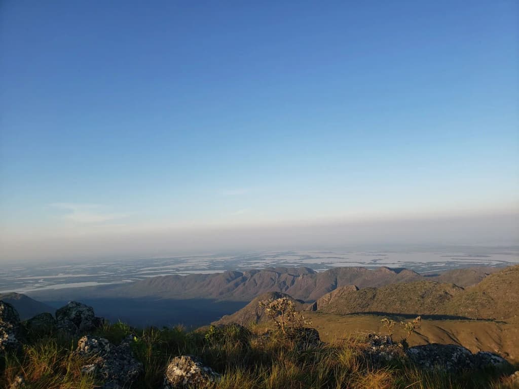 Simple guesthouse with hammocks and a view of the mountains