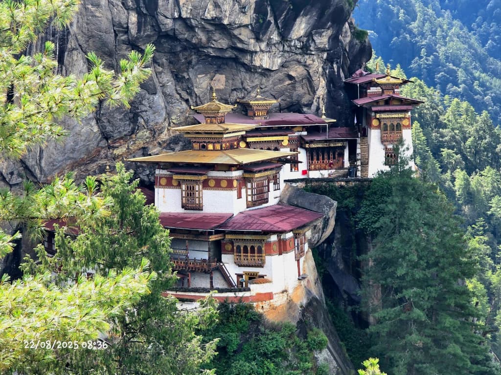 Tiger's Nest Monastery clinging to a cliff in Bhutan, shrouded in mist