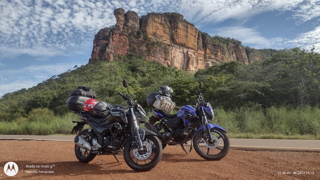 Crystal-clear pool surrounded by lush canyon walls