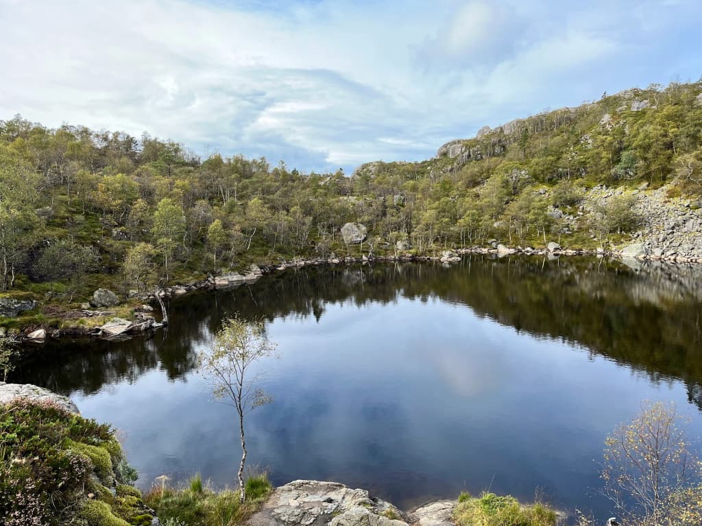 Hikers on the edge of Preikestolen
