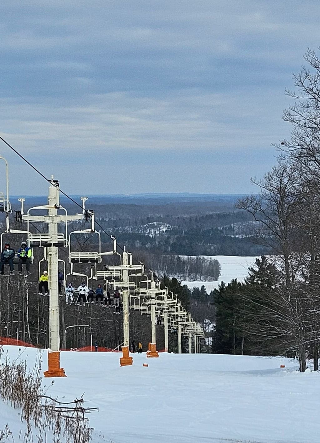 Red fishermen's cabins on stilts, Lofoten, with jagged peaks